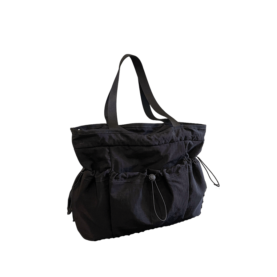 Black canvas ladies tote with front and side open pockets