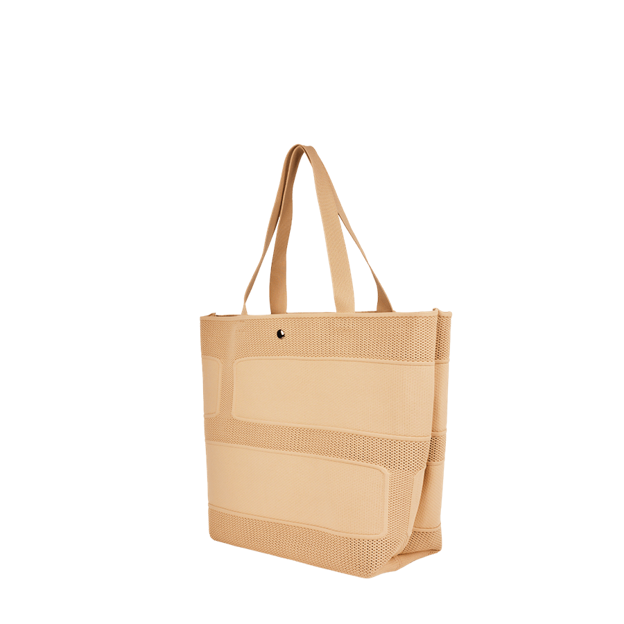 Beige ladies straw tote with magnetic snap closure