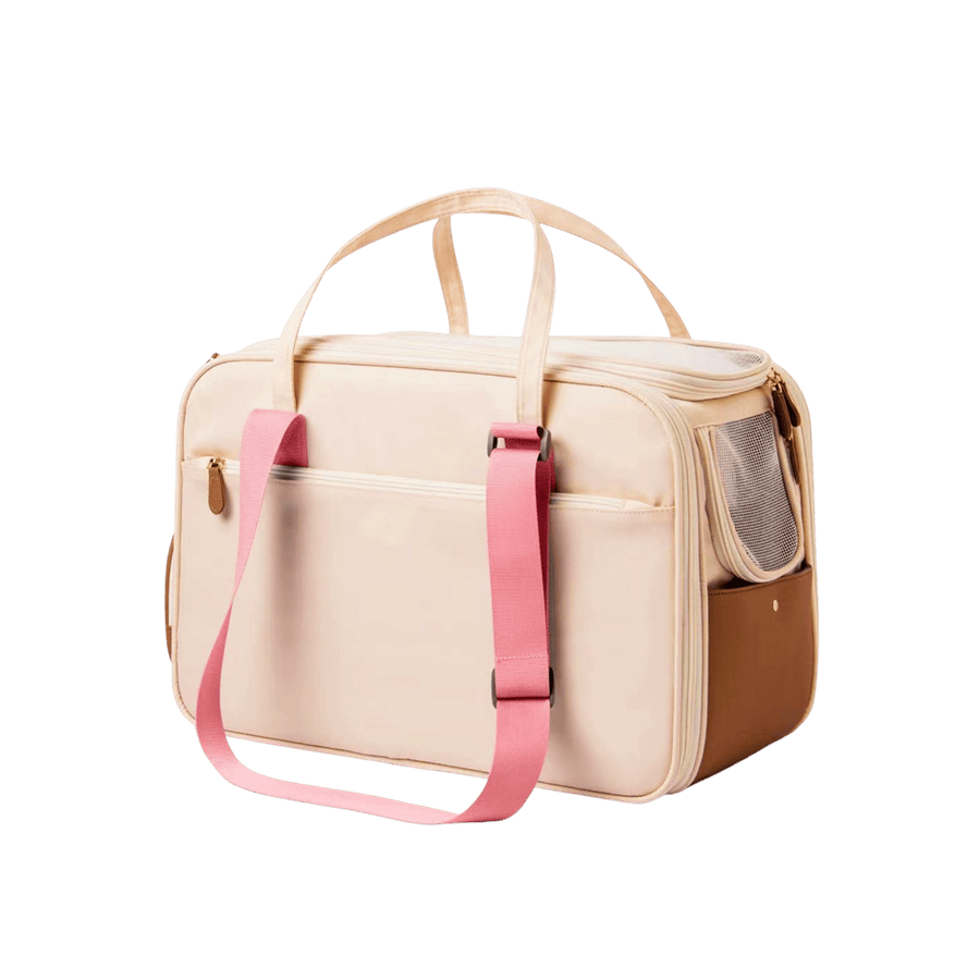 Beige pet bag with pink shoulder strap and mesh pocket