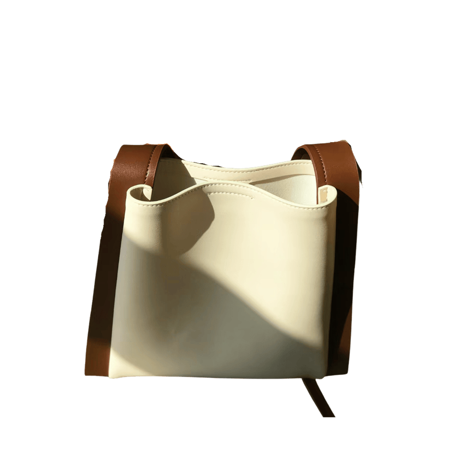 Beige ladies bucket bag with brown trim PU and magnetic snap closure