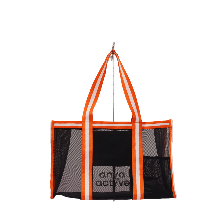Black mesh beach bag with stripe webbing and magnetic snap closure