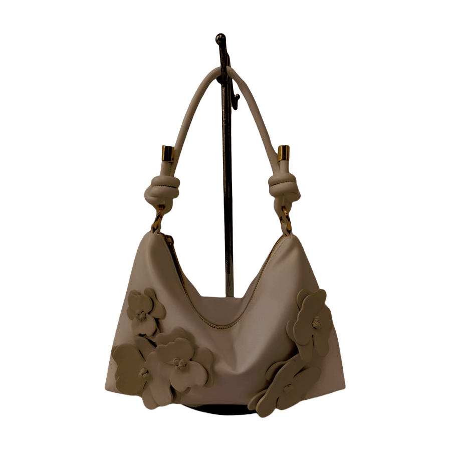 Grey ladies hobo bag with decorative flowers and knotted handle
