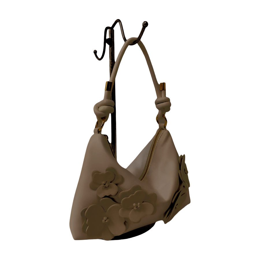Grey ladies hobo bag with decorative flowers and knotted handle