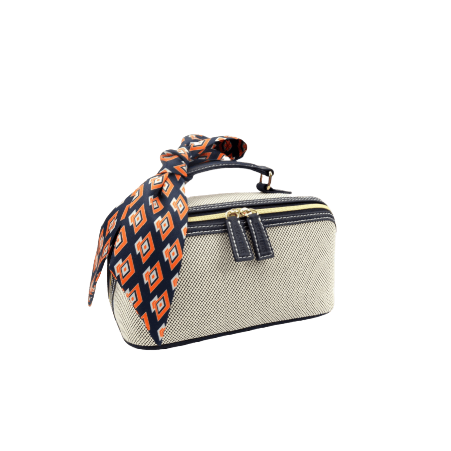 Beige ladies cosmetic bag with blue trim PU and decorative scraf on the handle