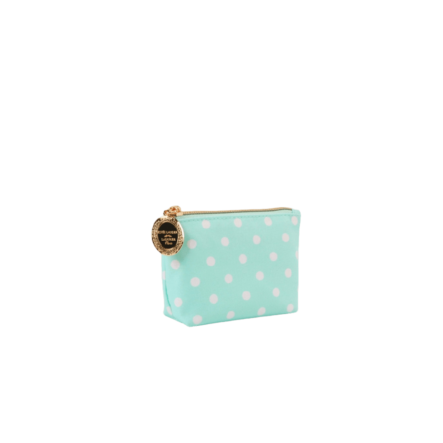 Blue cosmetic bag with white dots and round metal zip puller
