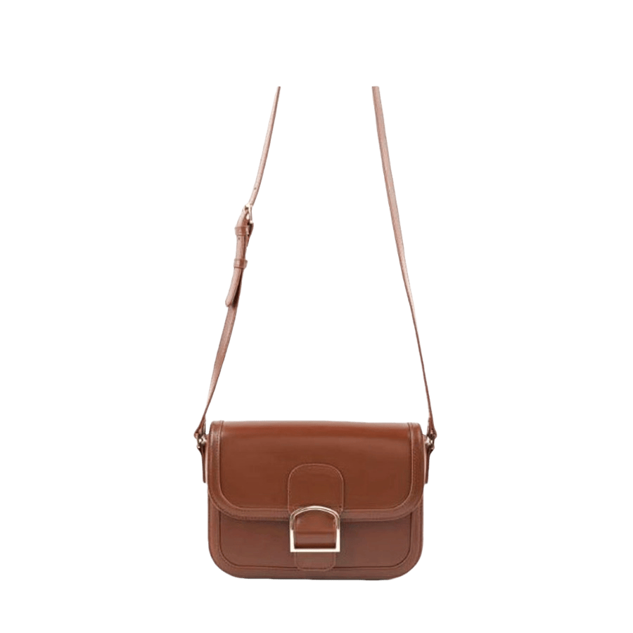 Brown ladies crossbody bag with decorative big buckle and magnetic snap closure