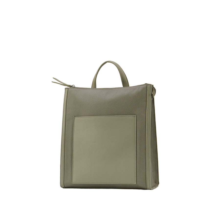 Green ladies backpack with green trim PU and front open pocket
