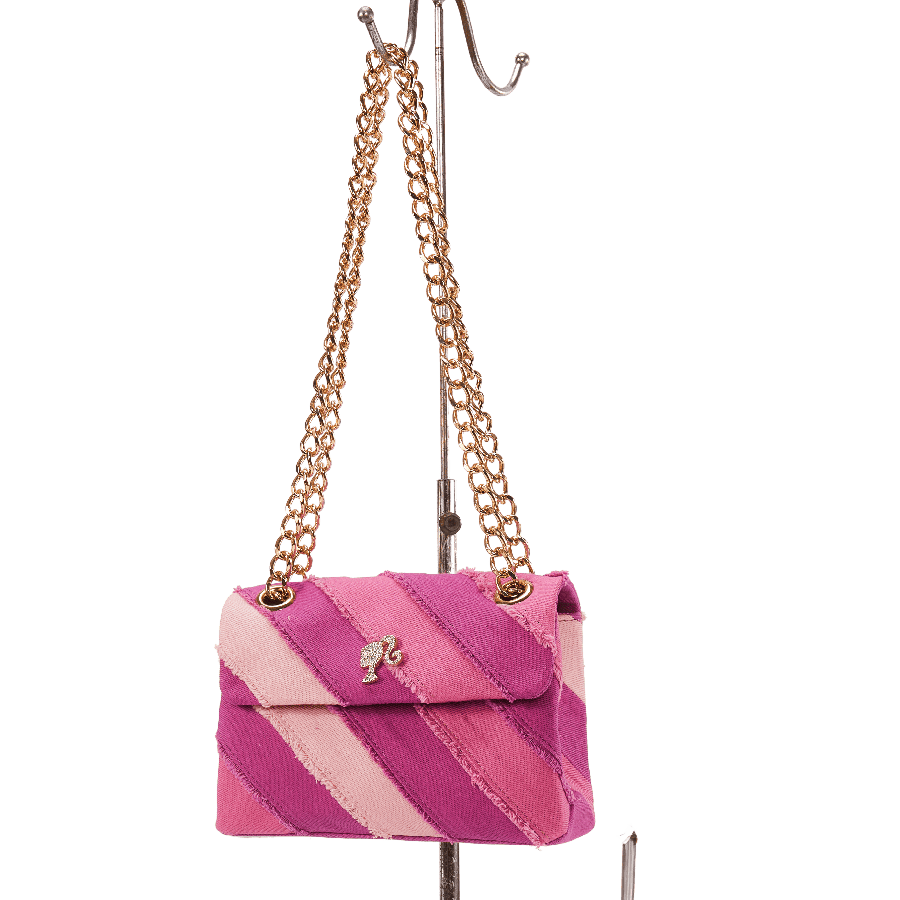 Pink splicing canvas ladies handbag with decorative hardware and magnetic snap closure