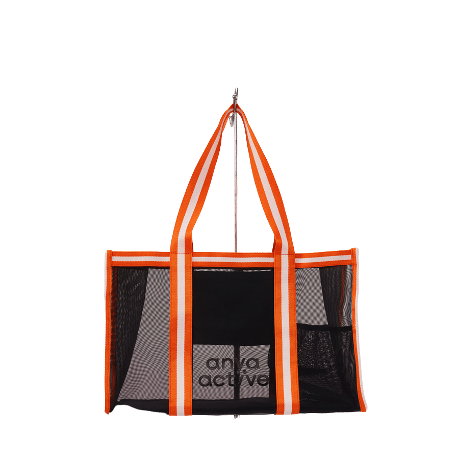 Black mesh beach bag with stripe webbing and magnetic snap closure