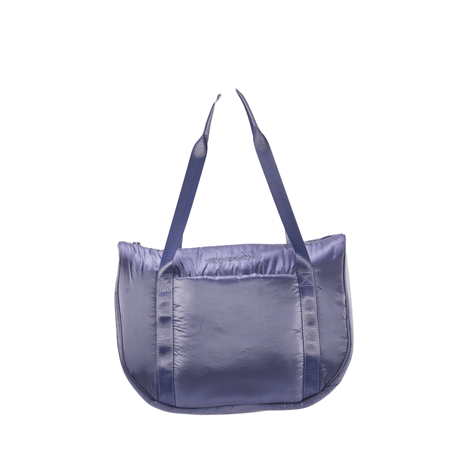 Blue puffy ladies handbag with front open pocket and top zip closure