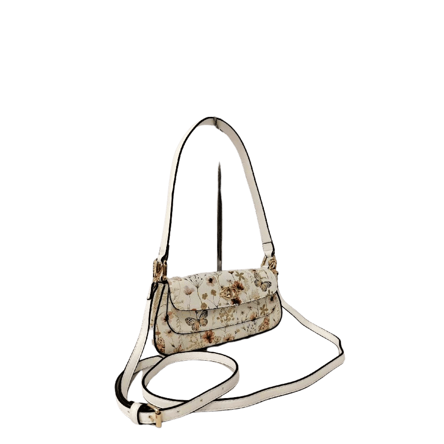 Floral print ladies handbag with decorative hardware on the flap and magnetic snap closure