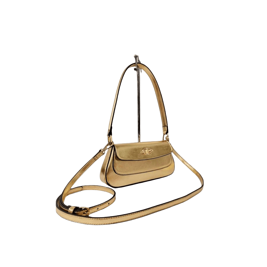 Gold ladies handbag with decorative hardware on the flap and magnetic snap closure