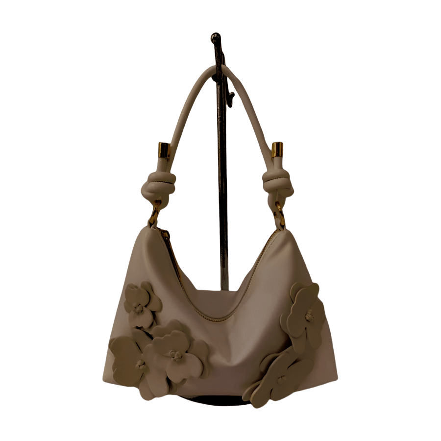 Grey ladies hobo bag with decorative flowers and knotted handle