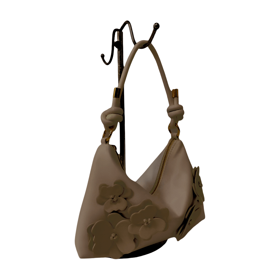 Grey ladies hobo bag with decorative flowers and knotted handle