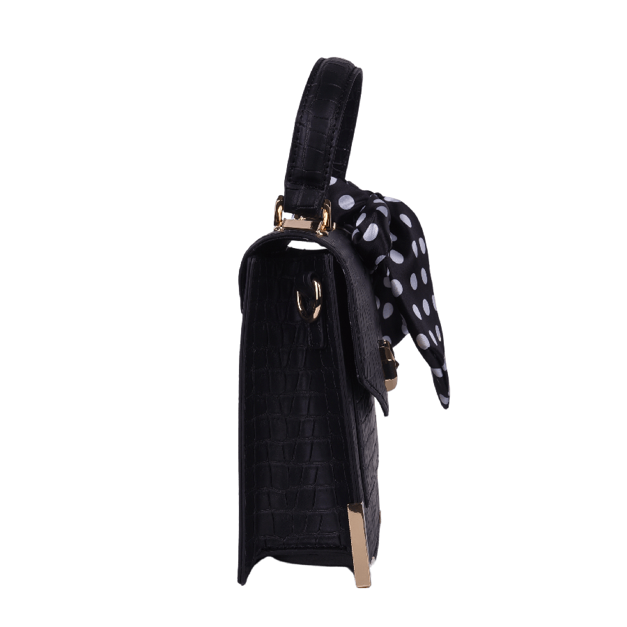 Black ladies handbag with decorative scarf and lock closure