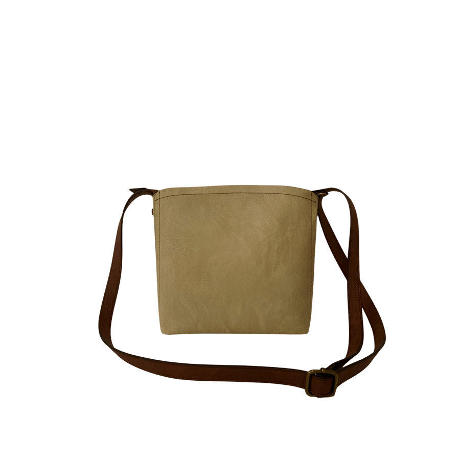 Grey ladies bucket bag with decorative flat stud on the sides and magnetic snap closure