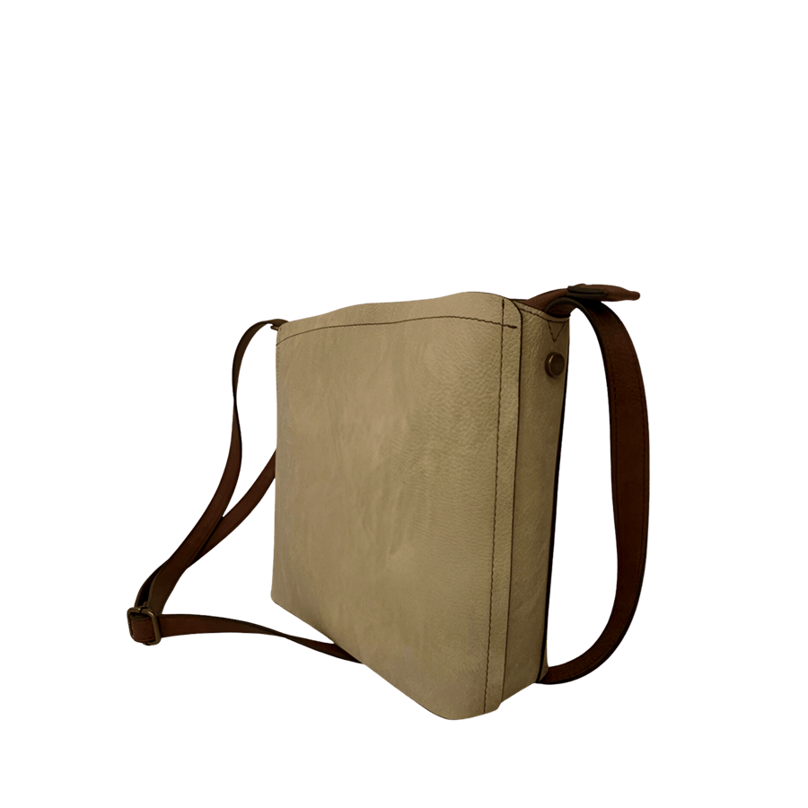 Grey ladies bucket bag with decorative flat stud on the sides and magnetic snap closure