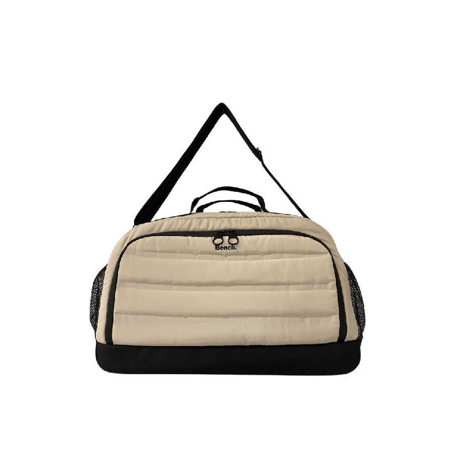 Beige quilting big duffel travelling bag with black trim and side mesh pockets