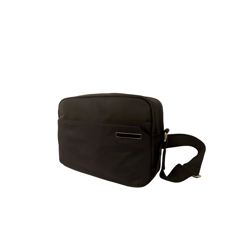 Black crossbody bag with front open pocket and black enemal metal plate