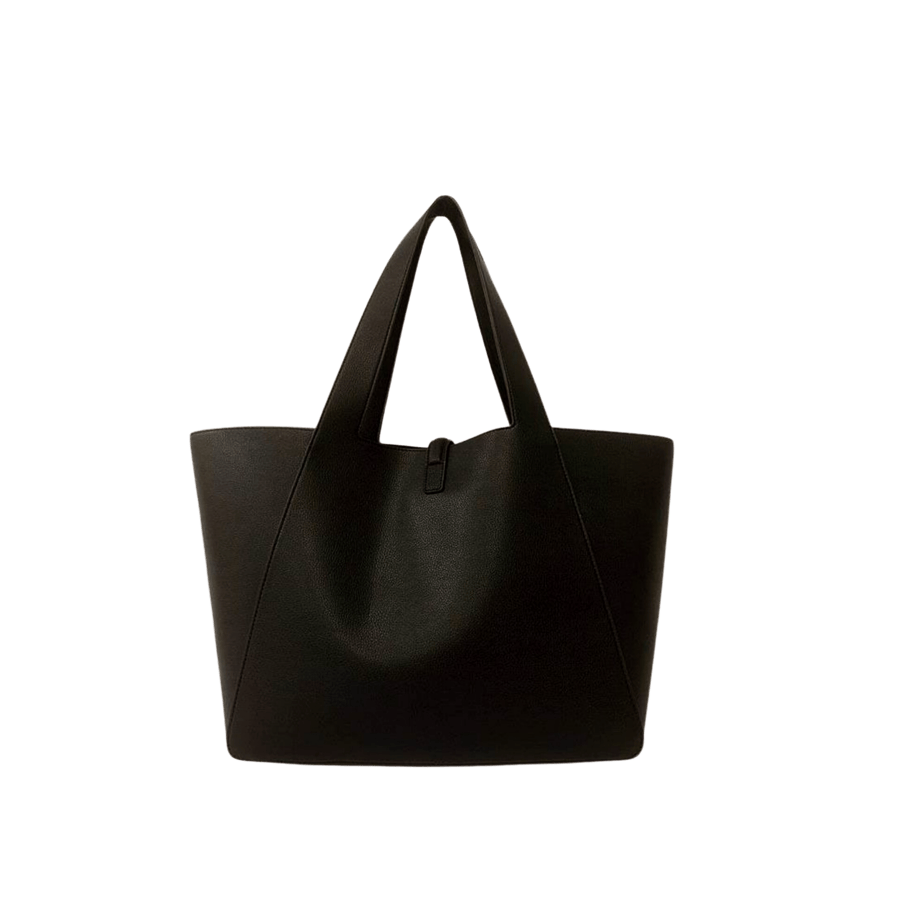 Black ladies tote bag with magnetic snap closure and decorative stud on the small flap