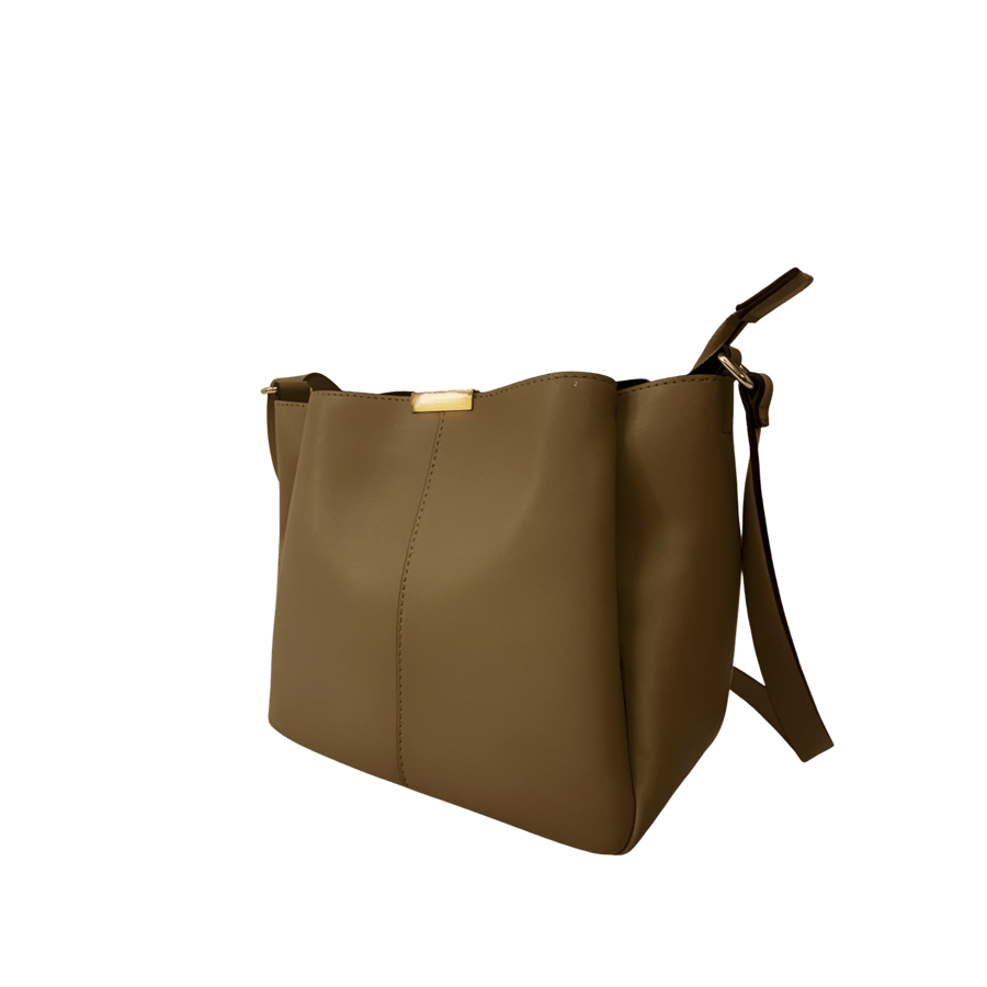 Grey ladies crossbody bag with magnetic snap closure and metal edge on the top