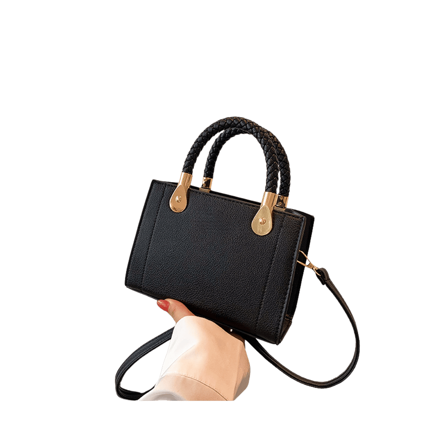 Black ladies handbag with weave handle and metal tab of handle