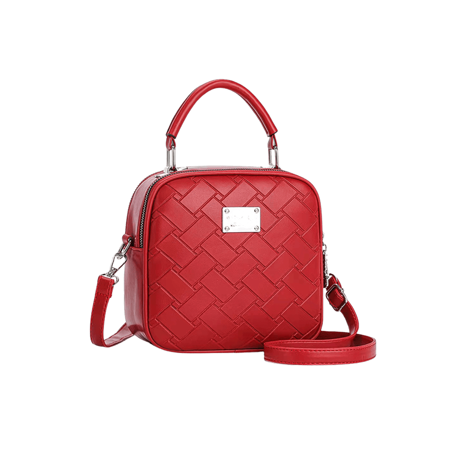 Red embossed ladies handbag with metal plate and contrast edge paiting
