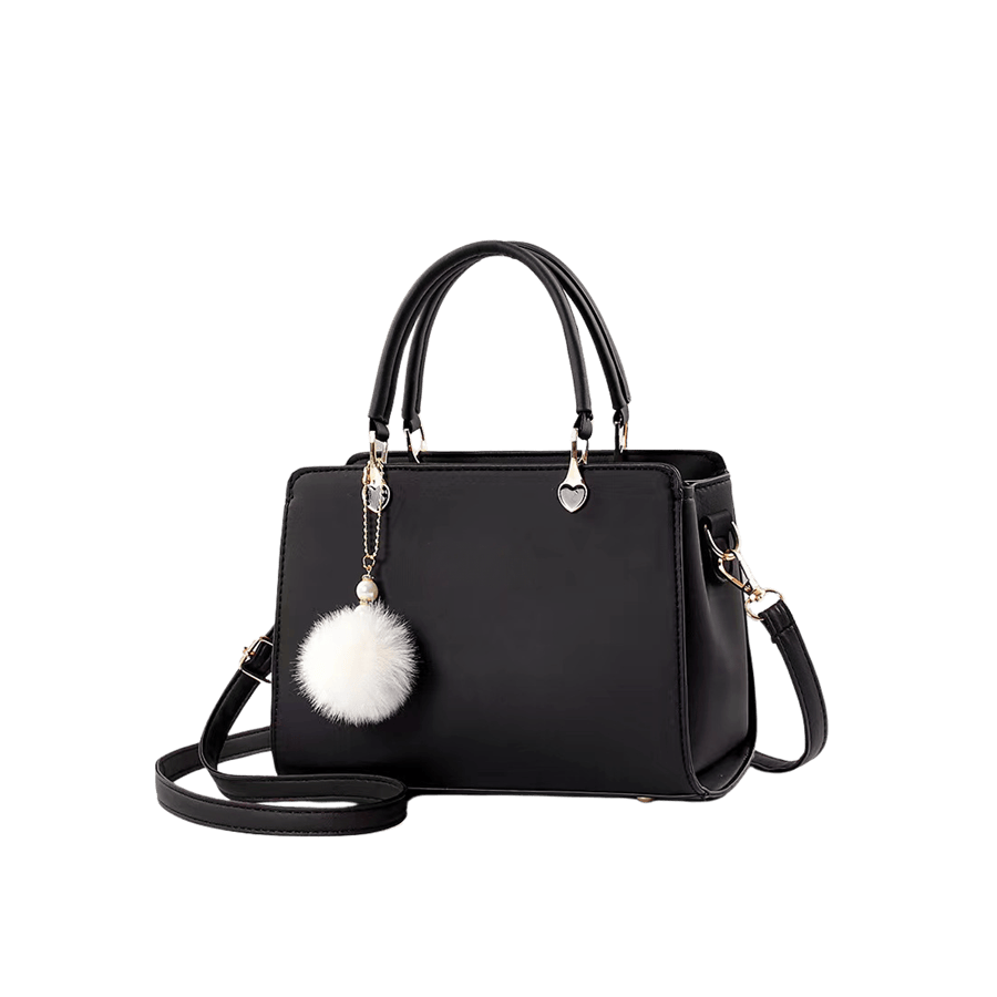Black ladies handbag with white pompom and metal tab of handle