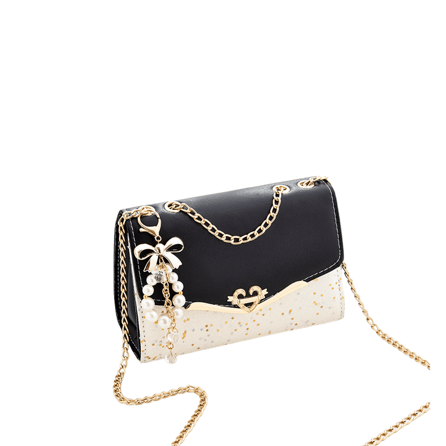 Metallic PU ladies crossbody bag with black trim PU and decorative heart-shaped hardware
