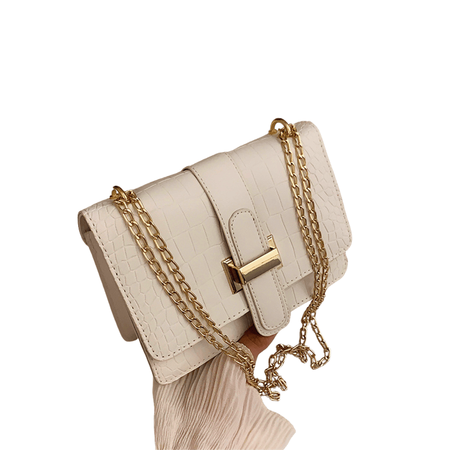 White croco PU ladies crossbody bag with metal bridge on the flap and magnetic snap clousre