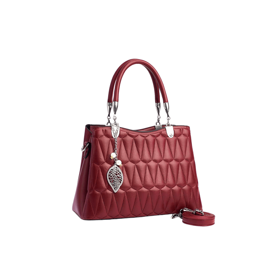 Red quilting ladies handbag with metal leaf hangtag and metal tab of handle