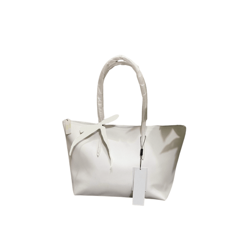 White ladies tote bag with ribbon bowknot on the handle