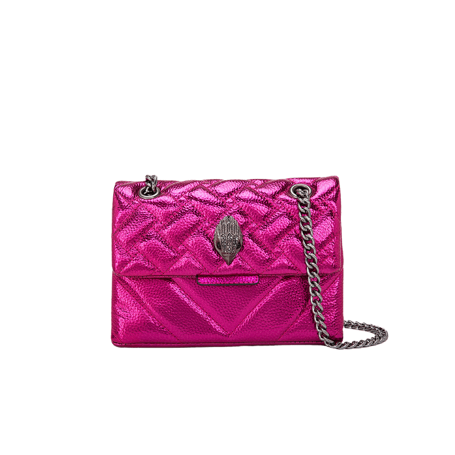 Metallic pink quilting ladies handbag with decorative hardware on the flap and magnetic snap closure