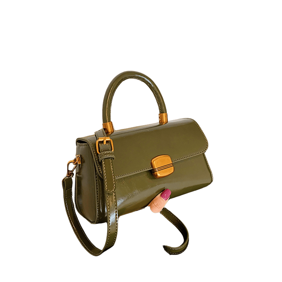 Green ladies handbag with metal tubular and lock