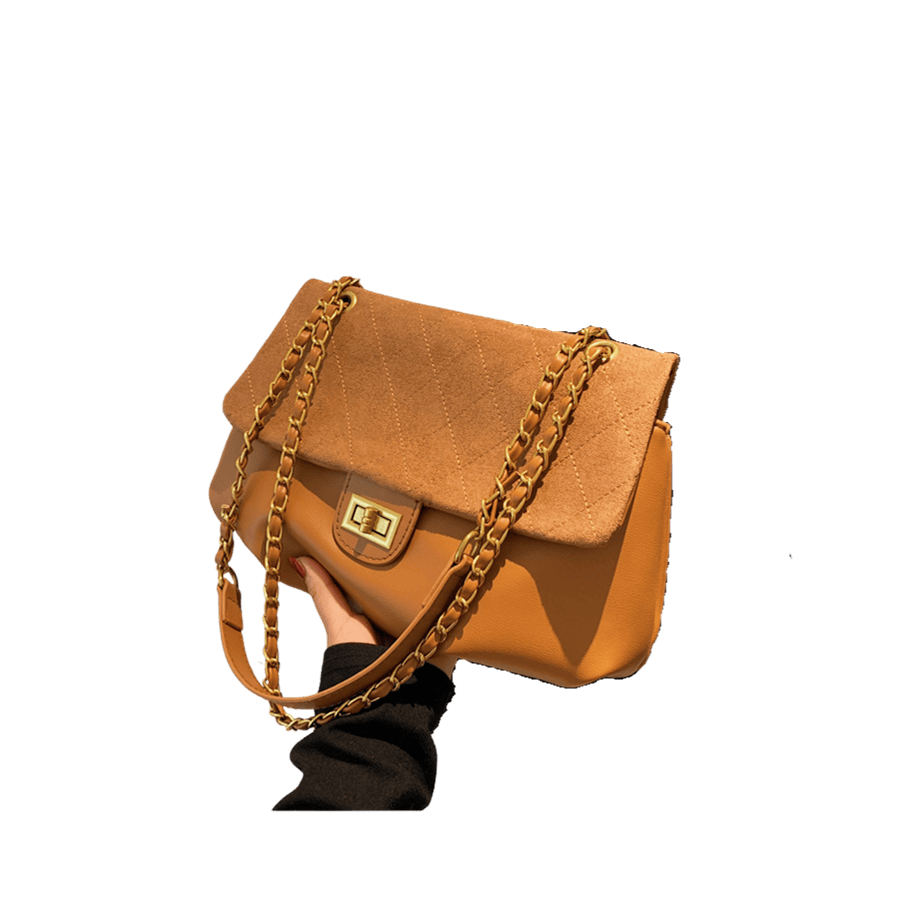 Brown ladies handbag with lock closure and stitching on the flap