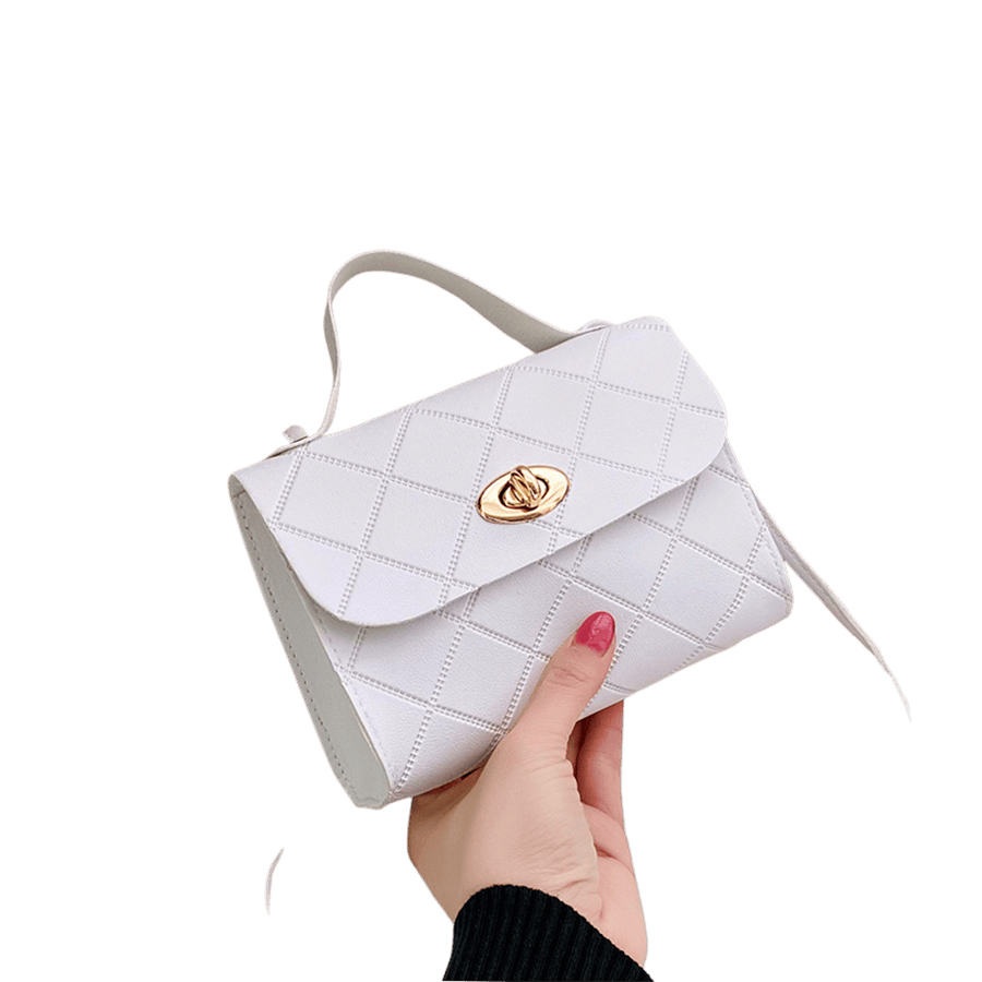 White embossed ladies handbag with lock closure