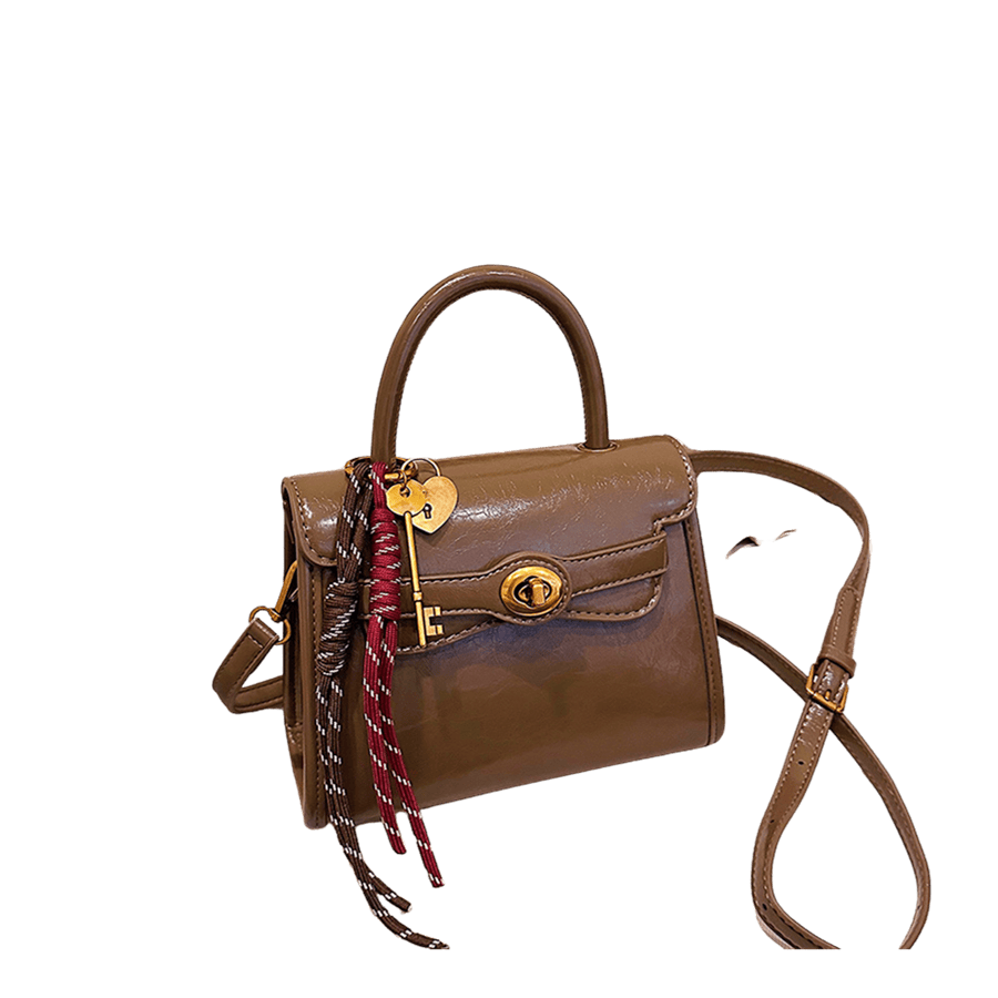 Khaki ladies handbag with string hangtag and lock closure