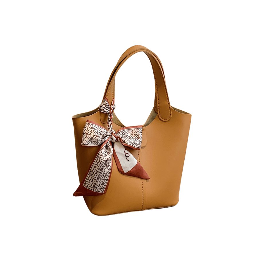 Camel ladies handbag with decorative scarf and magnetic snap closure