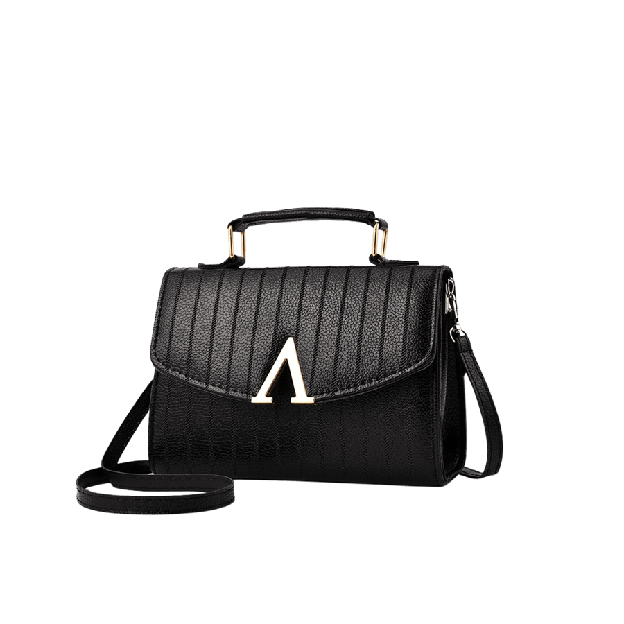Black embossed ladies handbag with decorative V shape hardware and magnetic snap closure