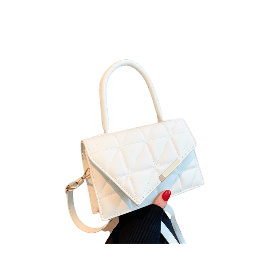 White quilting ladies handbag with decorative metal edge and magnetic snap closure