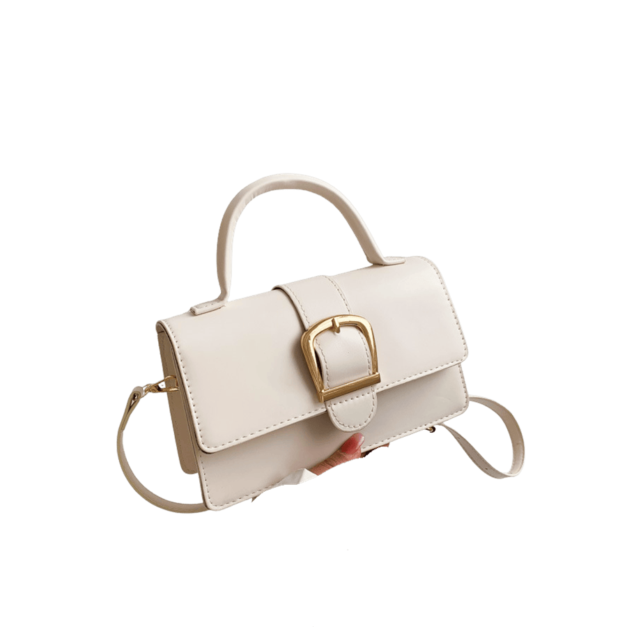 Beige ladies handbag with big silver buckle and magnetic snap closure