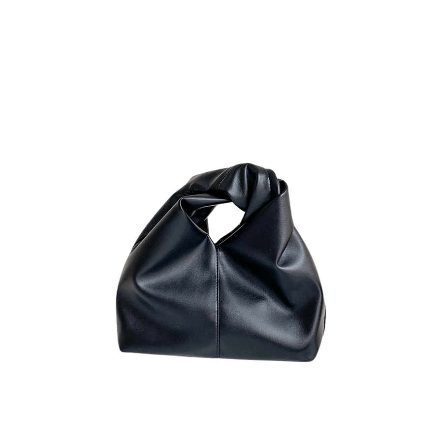 Black ladies handbag with middle stitching and twisty Handle
