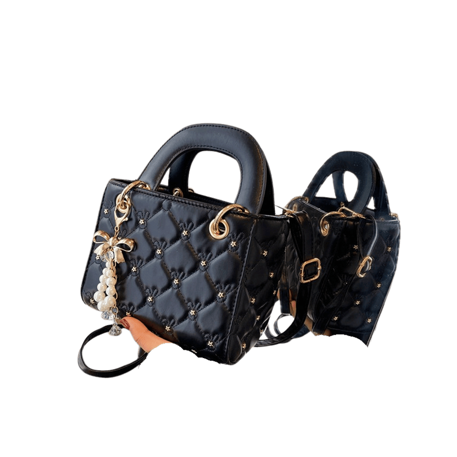Black quilting ladies handbag with metal bowknot hangtag and decorative flower studs