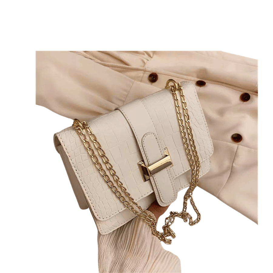 Beige croco PU ladies crossbody bag with metal bridge on the flap