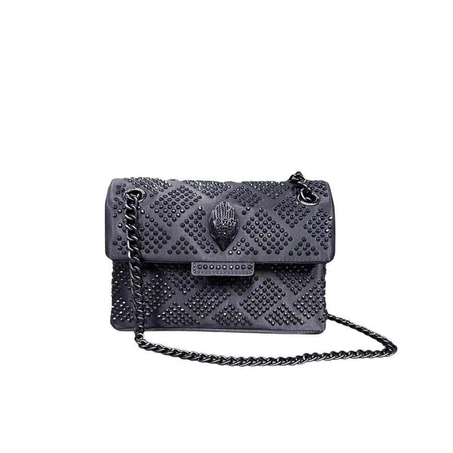 Grey ladies handbag with decorative studs and hardware on the flap