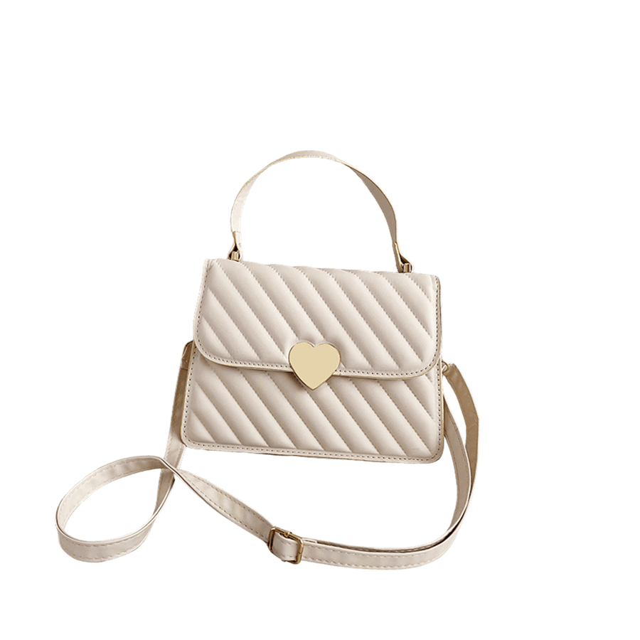 Beige quilting ladies handbag with heart-shaped hardware on the flap