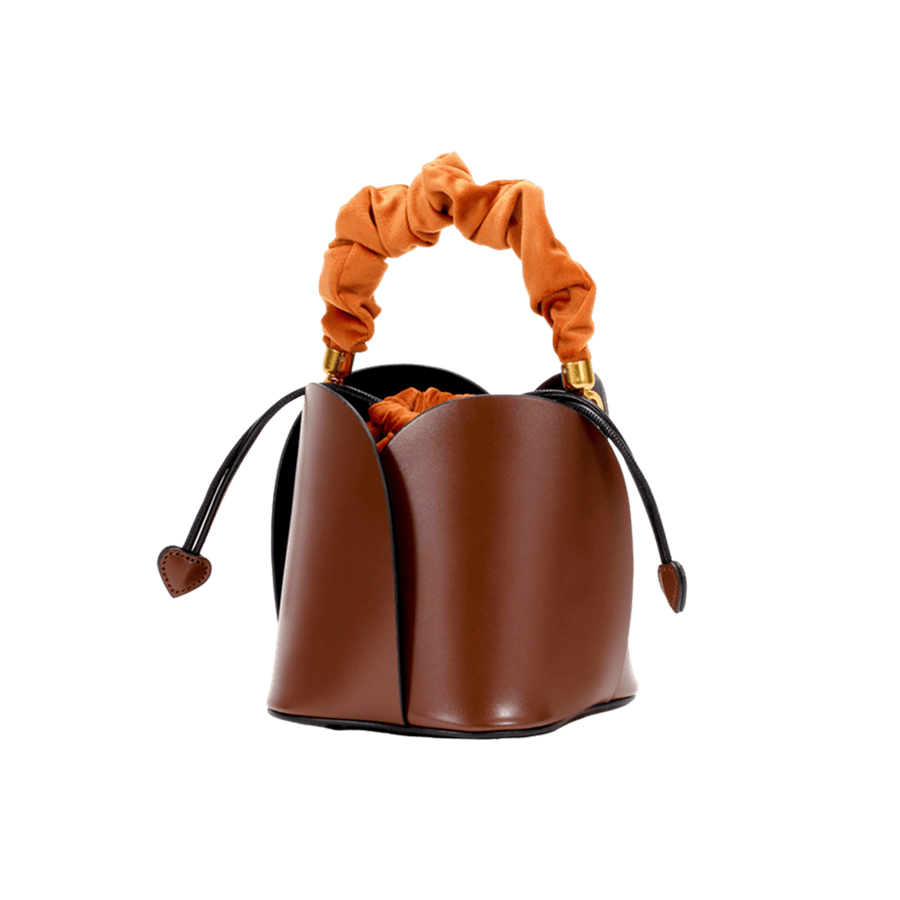 Brown ladies bucket bag with plicated handle and string closure