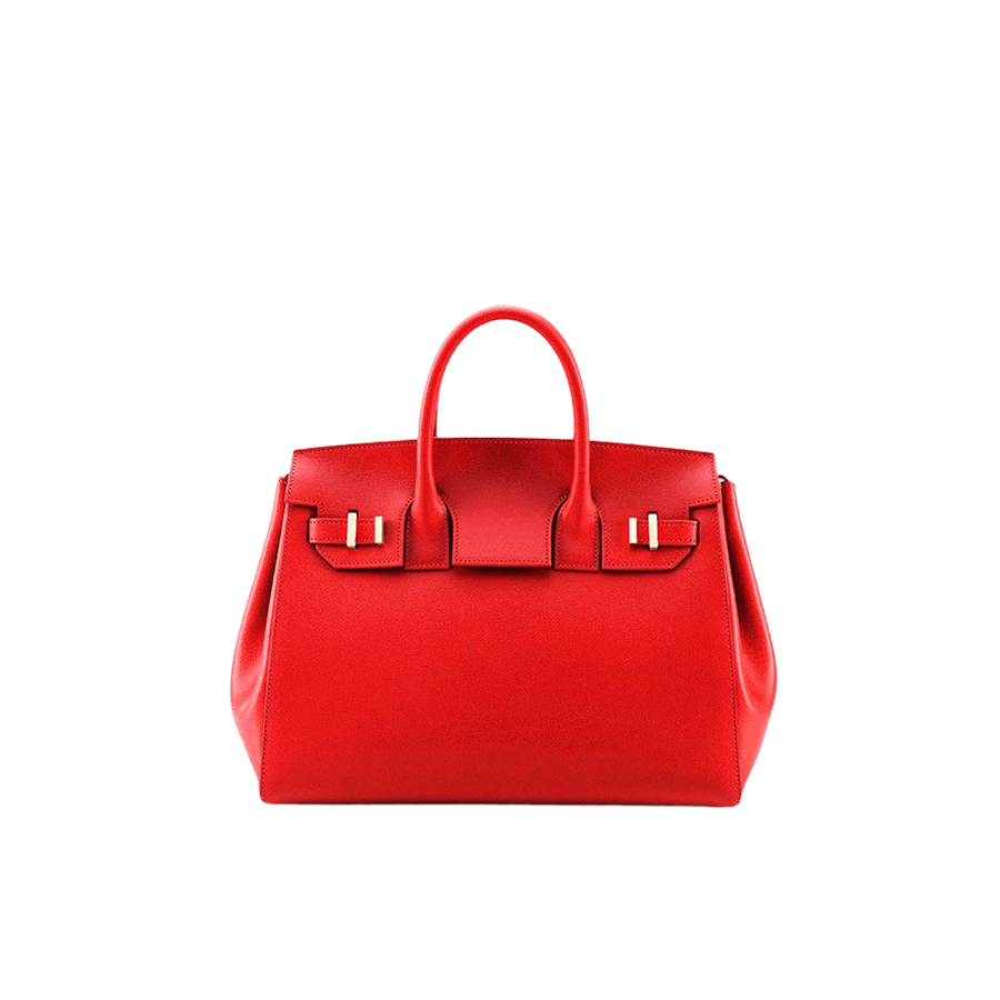 Red ladies handbag with decorative metal bridge and strap