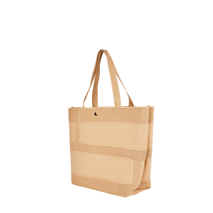 Beige ladies straw tote with magnetic snap closure