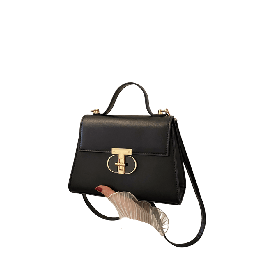 Black ladies handbag with enemal lock and metal tab on the handle